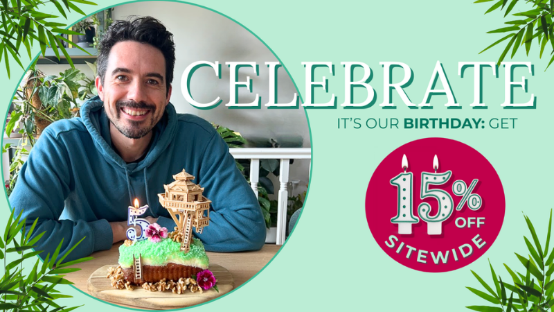 LARS with a cake and promotional text for a birthday sale FOR TINY TREEHOUSES on a light green background